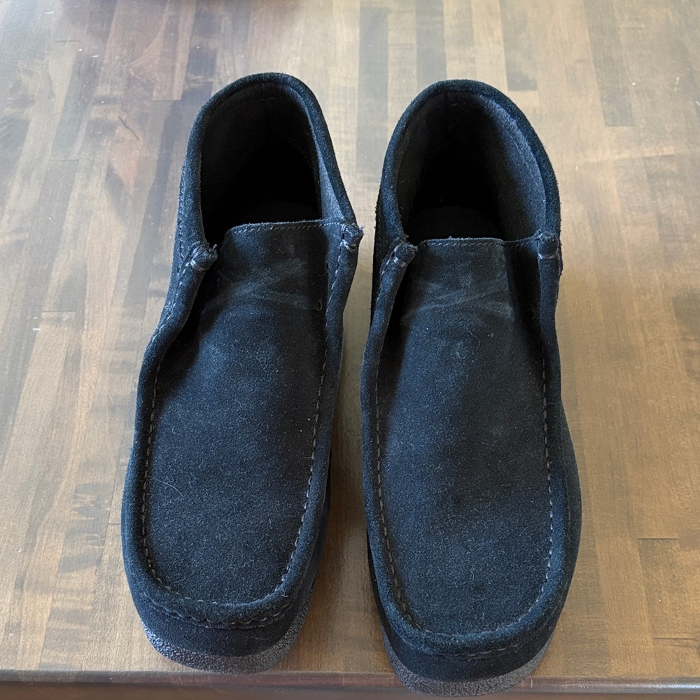 Clark’s wallabees. Brand new. No laces. Never worn